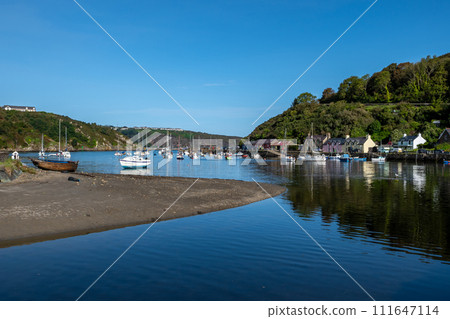 Old Harbor With Boats In The Village Fishguard At The Atlantic Coast Of Pembrokeshire In Wales, United Kingdom 111647114