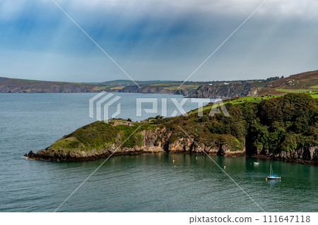 Coast And Old Fort Of The Village Fishguard At The Atlantic Coast Of Pembrokeshire In Wales, United Kingdom Coast And Old Fort Of The Village Fishguard At The Atlantic Coast Of Pembrokeshire In Wales, United Kingdom 111647118