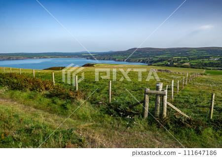 Coastal Path At The Wild Atlantic Coast Of Dinas Head In Pembrokeshire In Wales, United Kingdom Coastal Path At The Wild Atlantic Coast Of Dinas Head In Pembrokeshire In Wales, United Kingdom 111647186