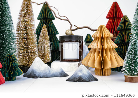 dark jar with lid on the background of Christmas decorations, side view dark jar with lid on the background of Christmas decorations, side view 111649366