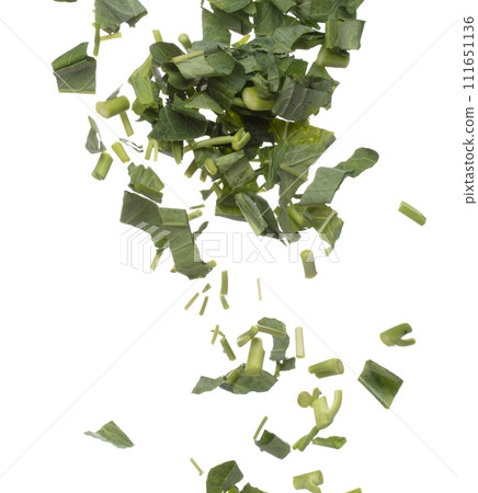 Kale fly fall mid air, green fresh vegetable chinese kale cut chop slice. Organic fresh vegetable with eaten leaf of chinese kale, heap close up texture. White background isolated freeze motion Kale fly fall mid air, green fresh vegetable chinese kale cut chop slice. Organic fresh vegetable with eaten leaf of chinese kale, heap close up texture. White background isolated freeze motion 111651136