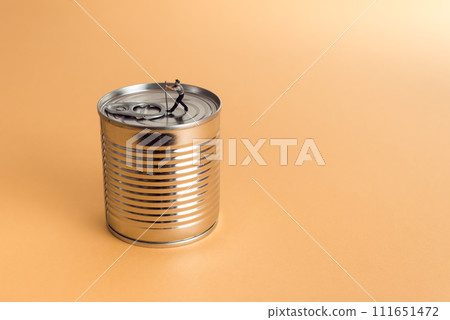 Close-up of man opening a tin can Close-up of man opening a tin can 111651472