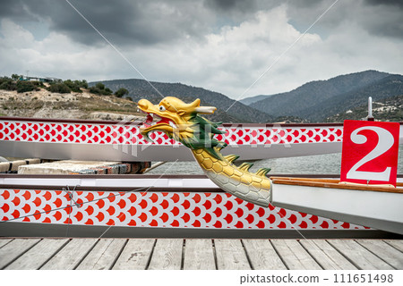 Moored dragon boats on the river jetty 111651498