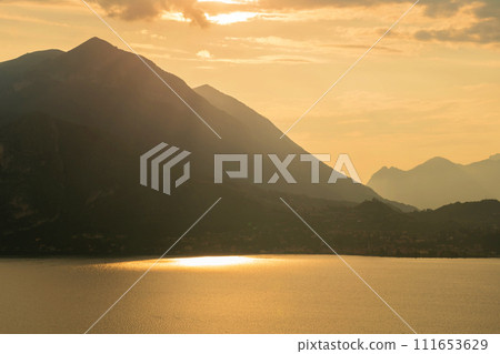Mountain landscape, picturesque mountain lake in the summer morning, panorama. Como, Italy 111653629
