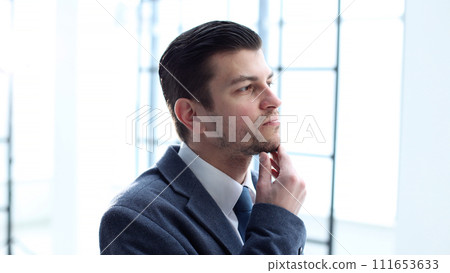 Male businessman in close-up in the office 111653633
