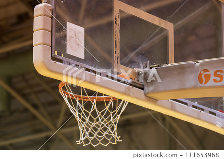 Basketball goal in the snow 111653968