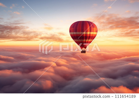 Colorful hot air balloon floats over a sea of clouds at sunset Colorful hot air balloon floats over a sea of clouds at sunset 111654189