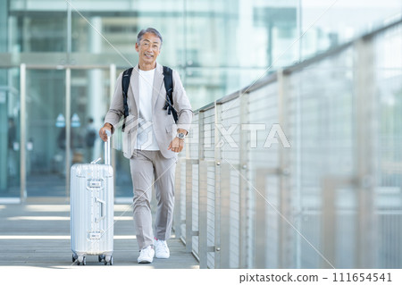 Senior man traveling Senior man traveling 111654541