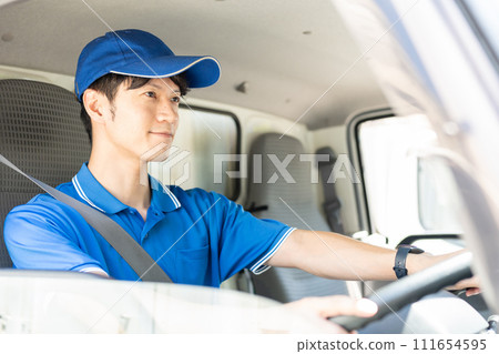 Delivery staff driving a car 111654595