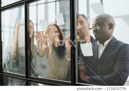 Young happy multiethnic diverse young professional creative team group students talking brainstorming 111655776