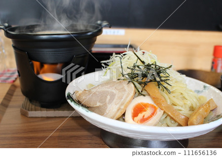 Warm feast with dipping noodles Warm feast with dipping noodles 111656136