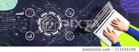 Real estate theme with person using a laptop 111656198