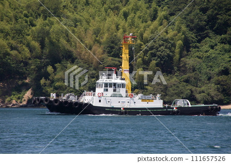 Tugboat passing through Kurushima Strait Tugboat passing through Kurushima Strait 111657526