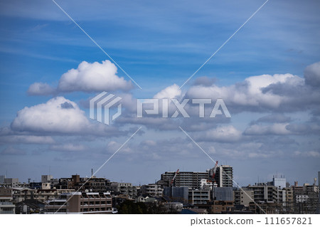 Spring sky, clouds floating peacefully Spring sky, clouds floating peacefully 111657821