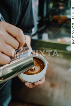 pouring milk for making latte art coffee pouring milk for making latte art coffee 111659013