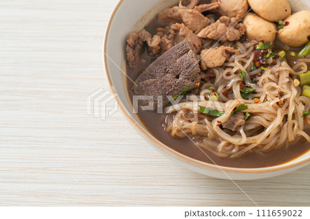 Thai noodle with pork, stewed pork, meatball and pork liver in blood soup 111659022