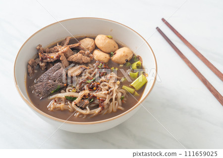 Thai noodle with pork, stewed pork, meatball and pork liver in blood soup Thai noodle with pork, stewed pork, meatball and pork liver in blood soup 111659025