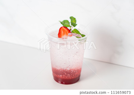 strawberry with soda in glass 111659073