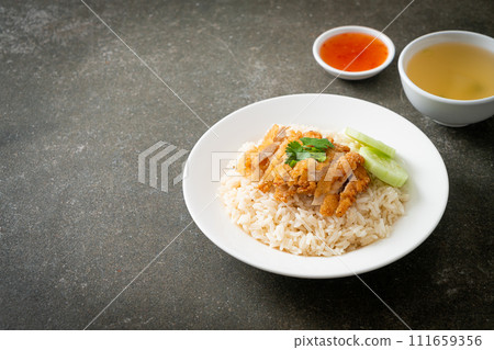 Steamed Rice with Fried Chicken or Hainanese Chicken Rice Steamed Rice with Fried Chicken or Hainanese Chicken Rice 111659356