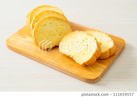 potatoes bread sliced on wood board potatoes bread sliced on wood board 111659557