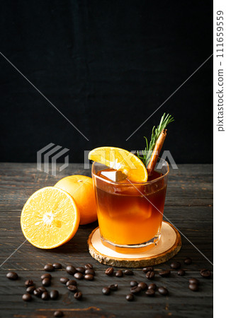 black coffee with orange and lemon juice 111659559