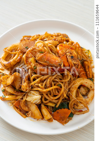 stir fried Tom Yum seafood dried spaghetti 111659644