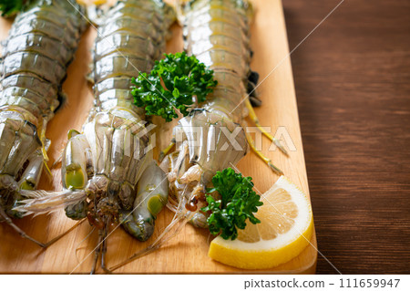 fresh mantis shrimp with lemon fresh mantis shrimp with lemon 111659947