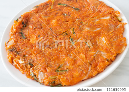 Korean Kimchi pancake or Kimchijeon Korean Kimchi pancake or Kimchijeon 111659995