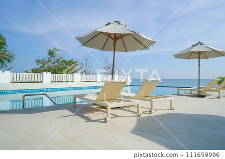 bed pool around swimming pool with sea background bed pool around swimming pool with sea background 111659996