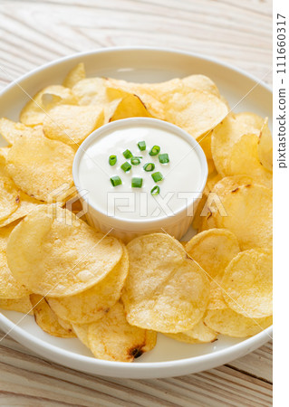 potato chips with sour cream potato chips with sour cream 111660317