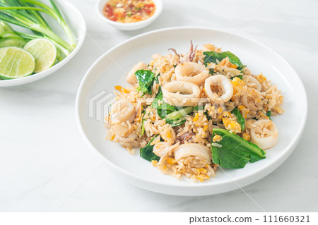 Fried rice with squid or octopus Fried rice with squid or octopus 111660321