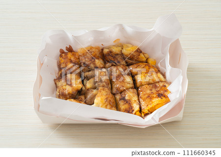 roti with egg, banana and chocolate 111660345