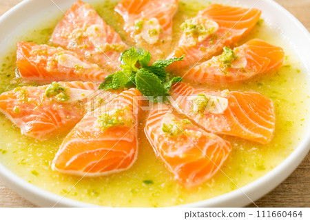Spicy Salmon in Seafood Salad Sauce 111660464
