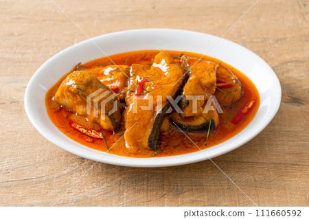 Redtail Catfish Fish in Dried Red Curry Sauce that called Choo Chee Redtail Catfish Fish in Dried Red Curry Sauce that called Choo Chee 111660592