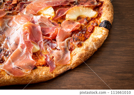 Pizza with prosciutto or parma ham pizza Pizza with prosciutto or parma ham pizza 111661010