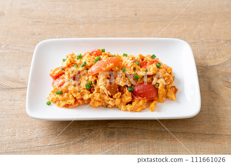 Stir-fried tomatoes with egg or Scrambled eggs with tomatoes Stir-fried tomatoes with egg or Scrambled eggs with tomatoes 111661026