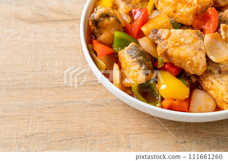 fish stew with tomato and pepper 111661260