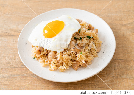 fried rice with pork and fried egg in Japanese style 111661324