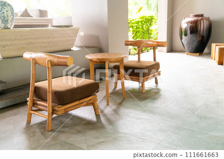 empty wood table and chair 111661663