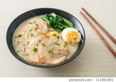 Ramen noodles in pork bone soup with roast pork and egg Ramen noodles in pork bone soup with roast pork and egg 111661865
