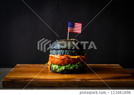 fried shrimps burger on wood tray 111661896