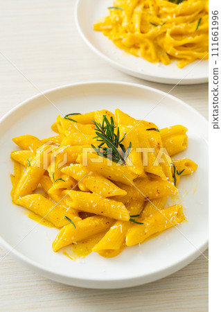 penne pasta with butternut pumpkin creamy sauce penne pasta with butternut pumpkin creamy sauce 111661996