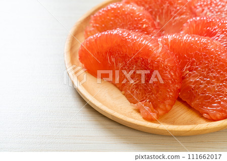 fresh red pomelo fruit or grapefruit 111662017
