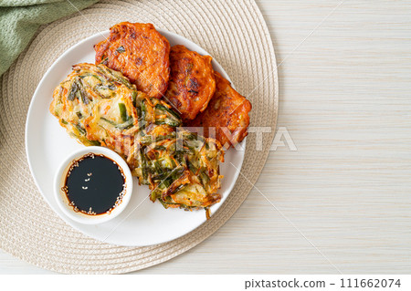 Pajeon or Korean pancake and Korean Kimchi pancake or Kimchijeon on white background 111662074