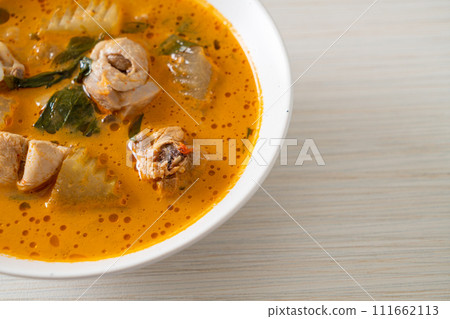 Chicken curry soup with roti Chicken curry soup with roti 111662113