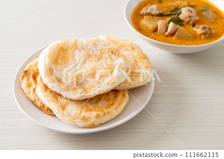 Chicken curry soup with roti Chicken curry soup with roti 111662115