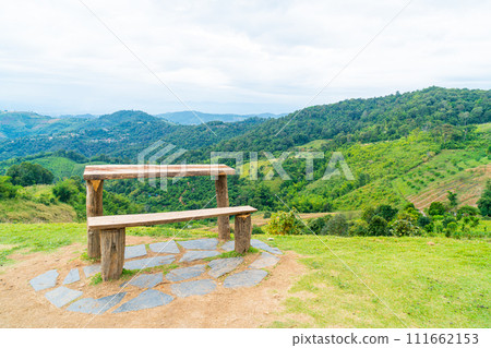 wood bar and chair with mountain hill background 111662153