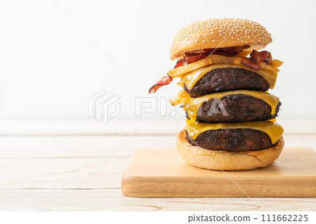hamburger or beef burgers with cheese, bacon and french fries hamburger or beef burgers with cheese, bacon and french fries 111662225