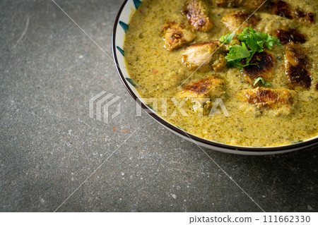Afghani chicken in green curry or Hariyali tikka chicken hara masala 111662330