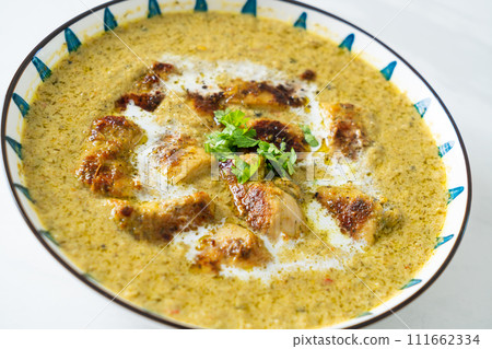 Afghani chicken in green curry or Hariyali tikka chicken hara masala Afghani chicken in green curry or Hariyali tikka chicken hara masala 111662334